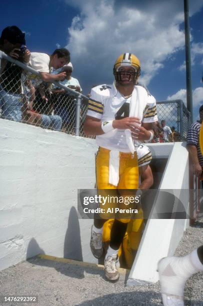 Quarterback Brett Favre of the Green Bay Packers enters the field in the Pro Football Hall Of Fame Game between the Green Bay Packers vs the Los...