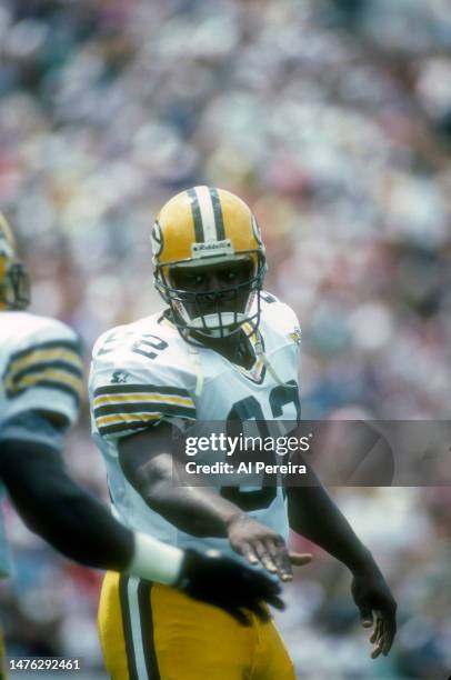 Defensive End Reggie White of the Green Bay Packers follows the action in the Pro Football Hall Of Fame Game between the Green Bay Packers vs the Los...