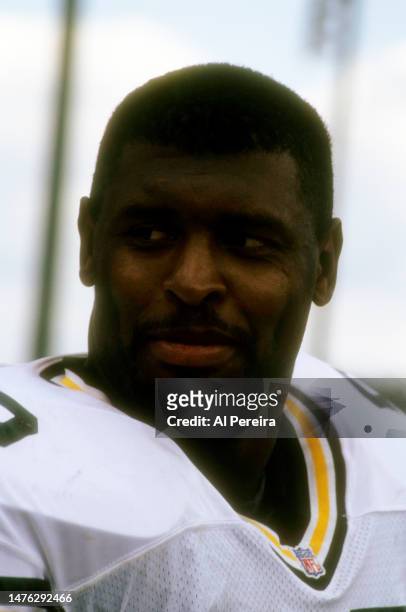 Defensive End Reggie White of the Green Bay Packers follows the action in the Pro Football Hall Of Fame Game between the Green Bay Packers vs the Los...