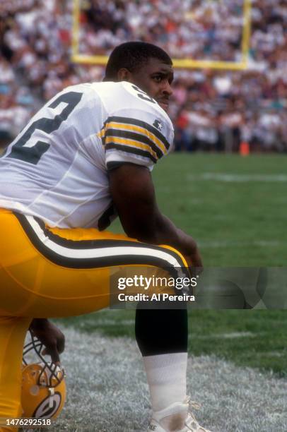 Defensive End Reggie White of the Green Bay Packers follows the action in the Pro Football Hall Of Fame Game between the Green Bay Packers vs the Los...