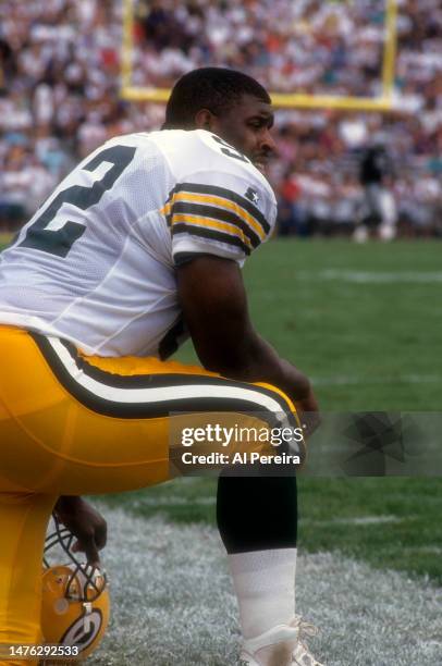 Defensive End Reggie White of the Green Bay Packers follows the action in the Pro Football Hall Of Fame Game between the Green Bay Packers vs the Los...