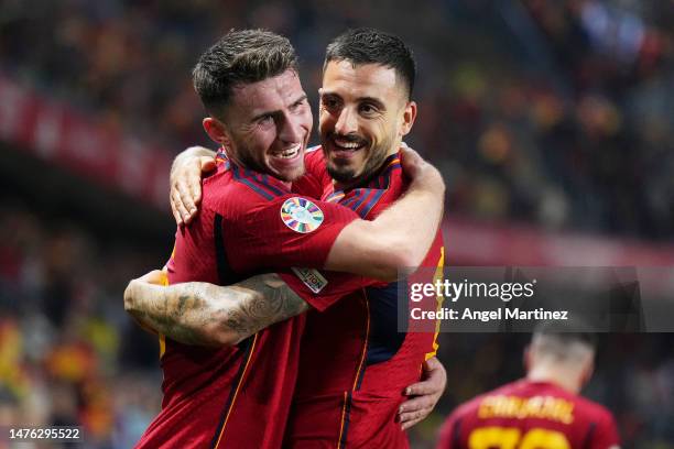 Joselu of Spain celebrates after scoring the team's second goal with Aymeric Laporte of Spain during the UEFA EURO 2024 Qualifying Round Group A...