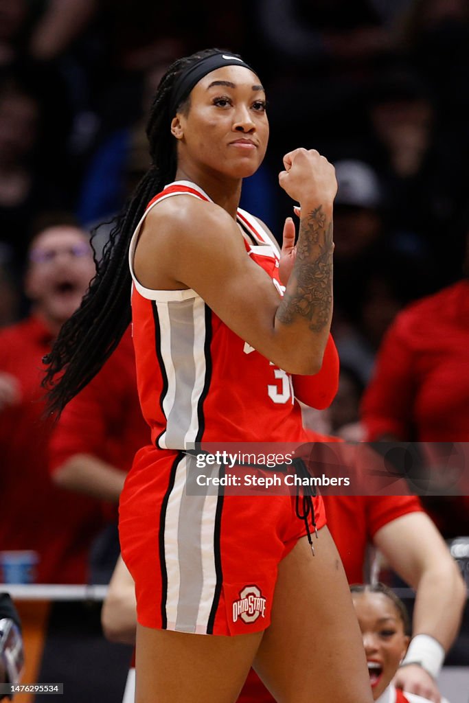 Cotie McMahon of the Ohio State Buckeyes reacts after being fouled