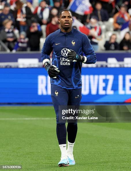 Mike Maignan of Team France warms up prior the UEFA EURO 2024... News ...