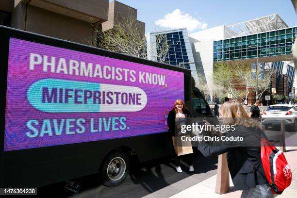 UltraViolet advocates are seen at the American Pharmacists Association Annual Conference at the Phoenix Convention Center on March 25, 2023 in...