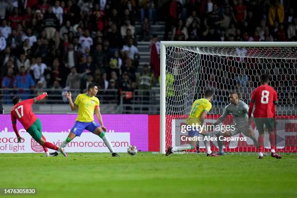 Sofiane Boufal of Morocco shoots for score their first side goal during the international friendly match between Morocco and Brazil at Grand Stade de...