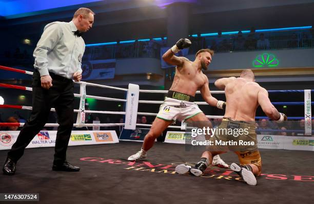 Felix Langberg of Germany knocks out Patrick Korte of Germany during their Heavyweight WBA Continental Europe title fight at Grand Elysée Hamburg on...