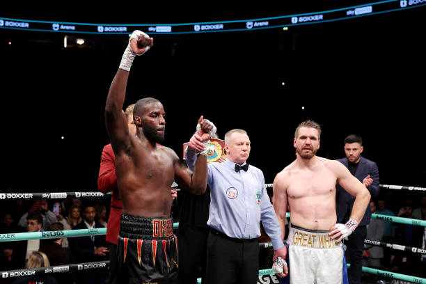 Lawrence Okolie celebrates victory over David Light after their 12x3 WBO World Cruiserweight Title fight at AO Arena on March 25, 2023 in Manchester,...