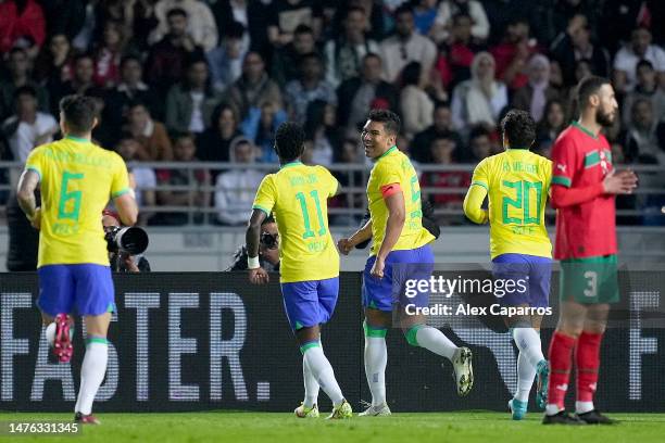 Casemiro of Brazil celebrates after scoring their first side goal during the international friendly match between Morocco and Brazil at Grand Stade...