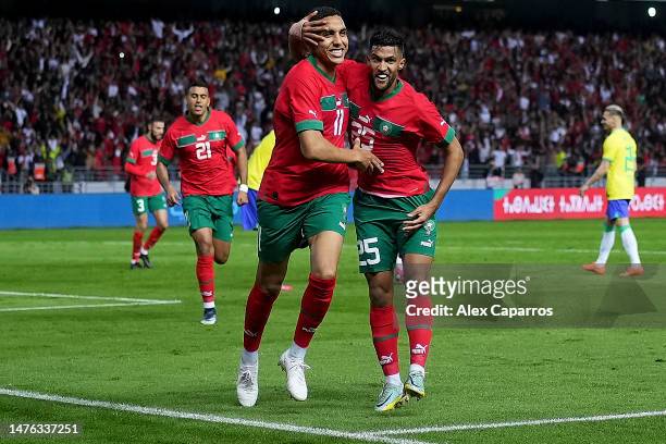Abdelhamid Sabiri of Morocco celebrates after scoring their second side goal with Yahya Attiat Allah of Morocco during the international friendly...