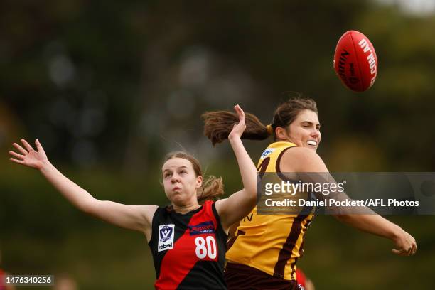 Caitlin Sargent of Essendon and Bella Gray of the Box Hill Hawks contest the ball during the round one VFLW match between the Essendon Bombers and...