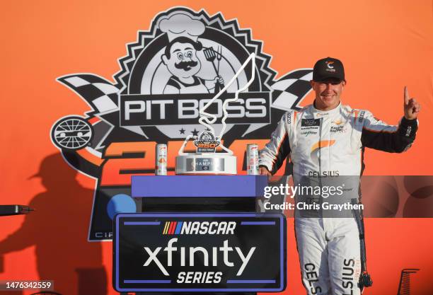 Allmendinger, driver of the Celsius Chevrolet, celebrates in victory lane after winning the NASCAR Xfinity Series Pit Boss 250 at Circuit of The...