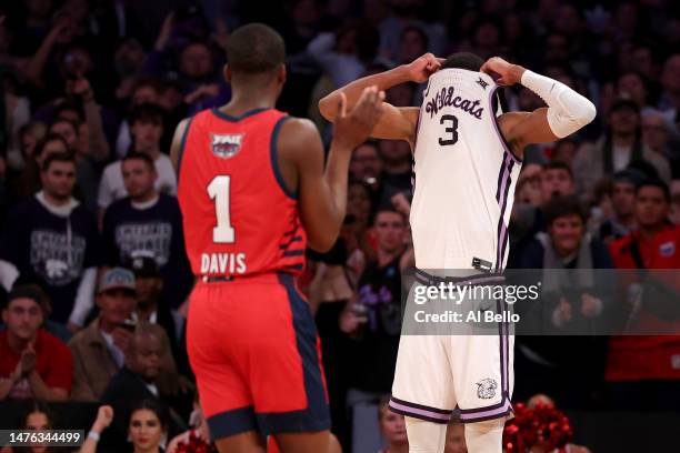 David N'Guessan of the Kansas State Wildcats reacts after fouling out against the Florida Atlantic Owls during the second half in the Elite Eight...