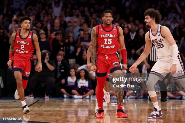 Nicholas Boyd and Alijah Martin of the Florida Atlantic Owls celebrate after defeating the Kansas State Wildcats in the Elite Eight round game of the...
