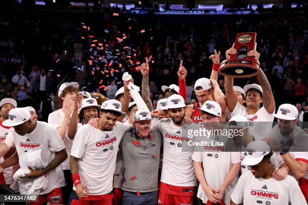 The Florida Atlantic Owls celebrate after defeating the Kansas State Wildcats in the Elite Eight round game of the NCAA Men's Basketball Tournament...