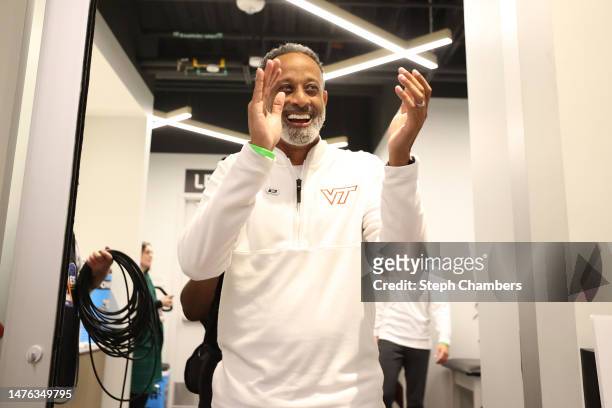 Head coach Kenny Brooks of the Virginia Tech Hokies reacts as he enters the locker room after defeating the Tennessee Lady Vols 73-64 in the Sweet 16...