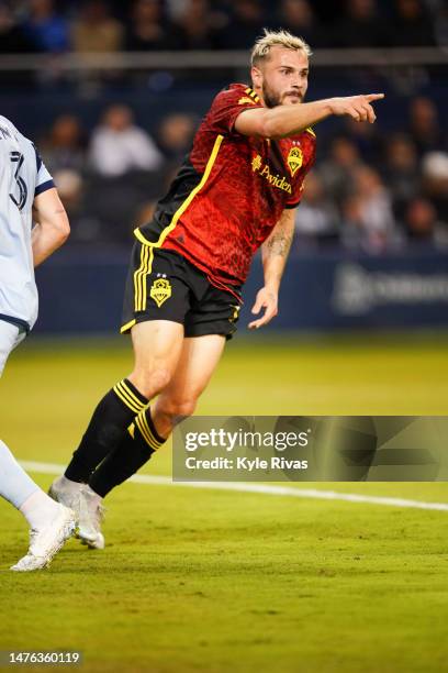 Jordan Morris of the Seattle Sounders celebrates scoring a goal against Sporting Kansas City during the first half at Children's Mercy Park on March...