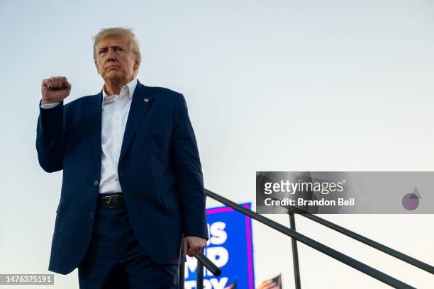 Former U.S. President Donald Trump prepares to depart after speaking during a rally at the Waco Regional Airport on March 25, 2023 in Waco, Texas....