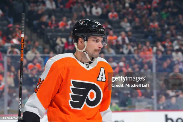 Scott Laughton of the Philadelphia Flyers looks on against the Detroit Red Wings at the Wells Fargo Center on March 25, 2023 in Philadelphia,...