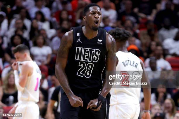Dorian Finney-Smith of the Brooklyn Nets reacts during the third quarter of the game against the Miami Heat at Miami-Dade Arena on March 25, 2023 in...