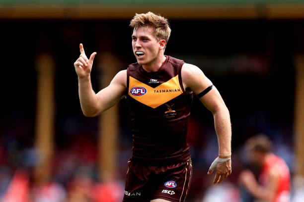 Dylan Moore of the Hawks celebrates kicking a goal during the round two AFL match between Sydney Swans and Hawthorn Hawks at Sydney Cricket Ground,...