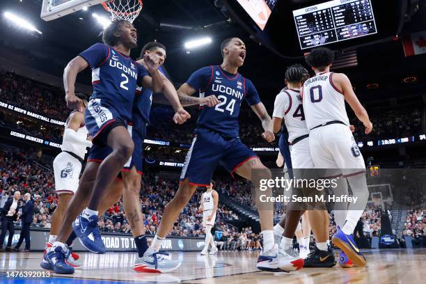 Jordan Hawkins of the Connecticut Huskies celebrates after a made basket during the second half against the Gonzaga Bulldogs in the Elite Eight round...