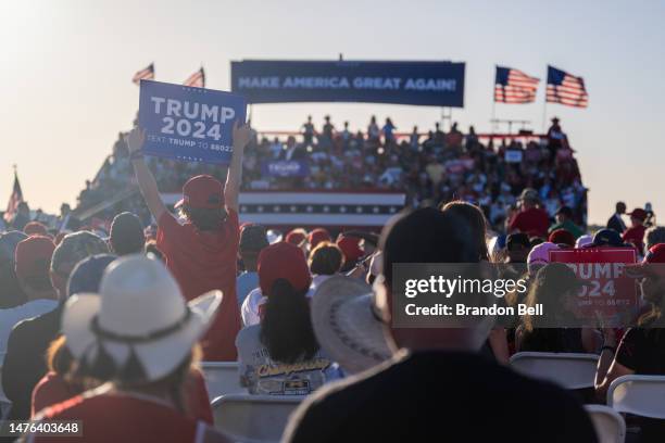 Supporters cheer as former U.S. President Donald Trump speaks at the Waco Regional Airport on March 25, 2023 in Waco, Texas. Former U.S. President...