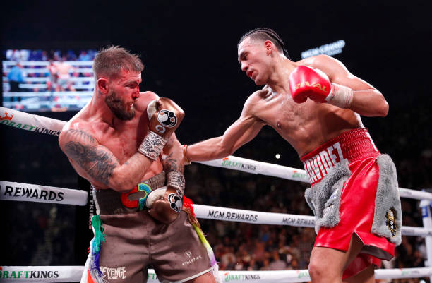 David Benavidez lands a body shot on Caleb Plant during a WBC super middleweight fight at MGM Grand Garden Arena on March 25, 2023 in Las Vegas,...