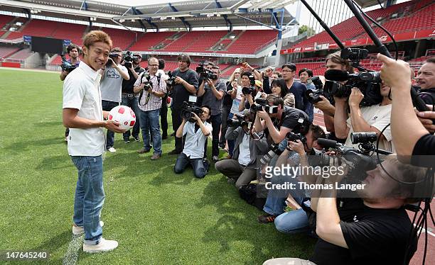 New signing Hiroshi Kiyotake poses for the media after 1 . FC Nuernberg´s press conference at the Stadion Nuernberg on July 2, 2012 in Nuremberg,...