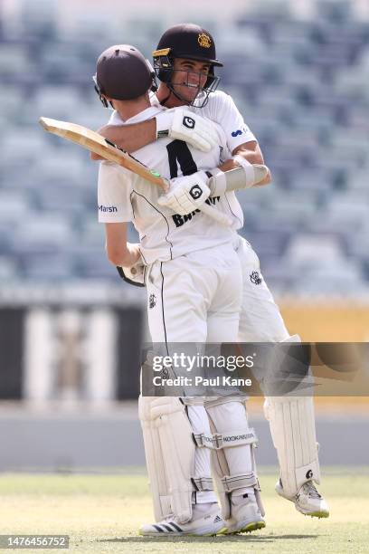 Cameron Bancroft and Teague Wyllie of Western Australia celebrate winning the Sheffield Shield Final match between Western Australia and Victoria at...