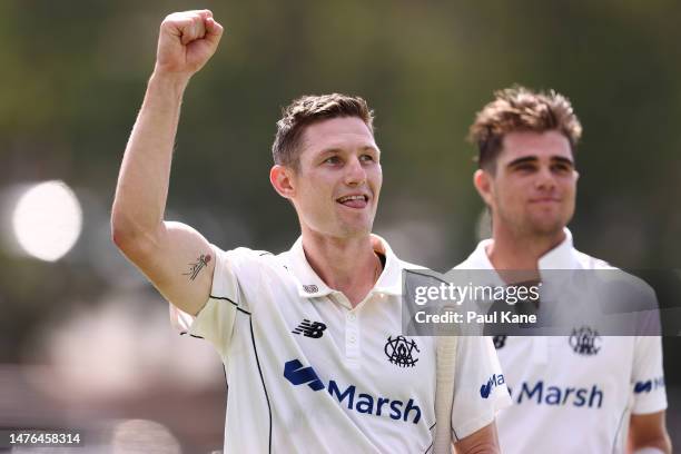 Cameron Bancroft and Teague Wyllie of Western Australia walk from the field after winning the Sheffield Shield Final match between Western Australia...