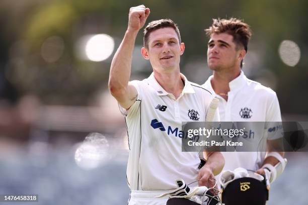 Cameron Bancroft and Teague Wyllie of Western Australia walk from the field after winning the Sheffield Shield Final match between Western Australia...