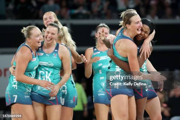 Emily Mannix of the Vixens and Mwai Kumwenda of the Vixens celebrate victory with team mates during the round two Super Netball match between...