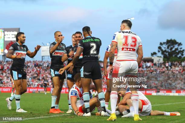 Jesse Ramien of the Sharks celebrates scoring a try during the round four NRL match between St George Illawarra Dragons and Cronulla Sharks at...