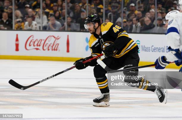 David Krejci of the Boston Bruins skates during the first period against the Tampa Bay Lightning at the TD Garden on March 25, 2023 in Boston,...