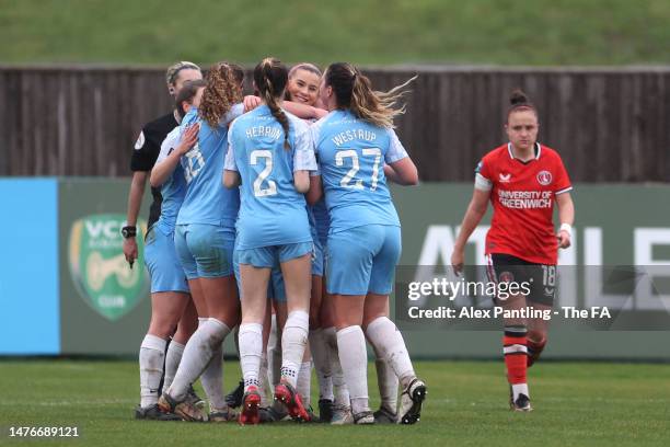 Jessica Brown of Sunderland celebrates with teammates after scoring the team's first goal during the Barclays FA Women's Championship match between...