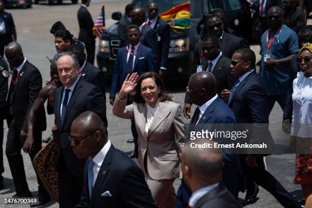 Vice President Kamala Harris waves upon her arrival at the Kotoka International Airport on March 26, 2023 in Accra, Ghana. Vice President Harris is...