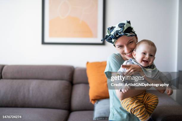 mother with cancer. - headband stock pictures, royalty-free photos & images