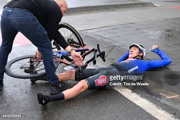 Søren Kragh Andersen of Denmark and Team Alpecin-Deceuninck injured after being involved in a crash during the 85th Gent-Wevelgem in Flanders Fields...