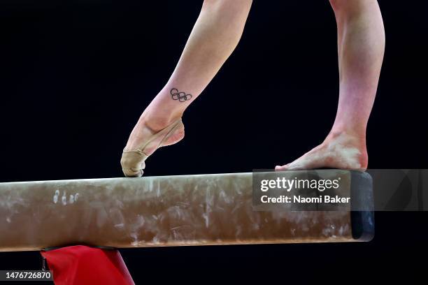 Detailed view of the olympics tattoo of Alice Kinsella of Park Wrekin as she performs on the beam during Day Four of the 2023 Artistic Gymnastics...