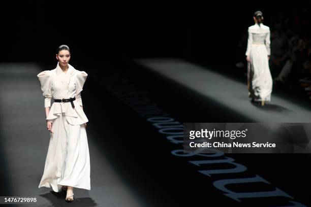 Model walks the runway at nunu&nono collection show by Chinese designer Zhang En on day two of the 2023 Autumn/Winter Shanghai Fashion Week at...