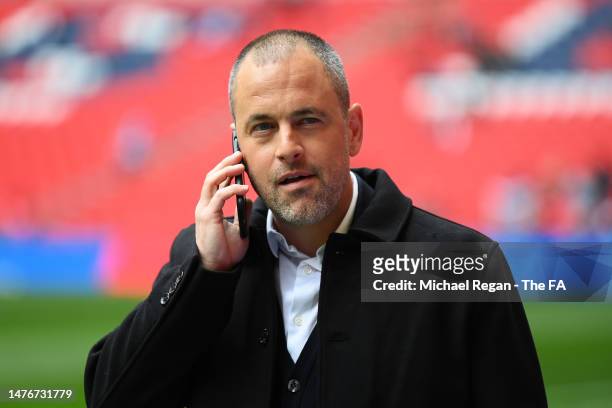 Former England footballer, Joe Cole speaks on the phone prior to the UEFA EURO 2024 qualifying round group C match between England and Ukraine at...