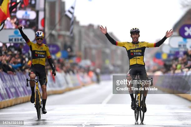 Wout Van Aert of Belgium and race winner Christophe Laporte of France and Team Jumbo-Visma celebrate at finish line during the 85th Gent-Wevelgem in...