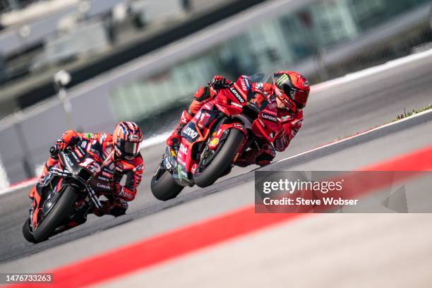 Francesco Bagnaia of Italy and Ducati Lenovo Team leads the race in front of Maverick Viñales of Spain and Aprilia Racing during the race of the...