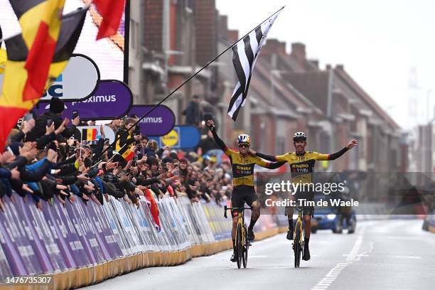 Wout Van Aert of Belgium and race winner Christophe Laporte of France and Team Jumbo-Visma celebrate at finish line during the 85th Gent-Wevelgem in...