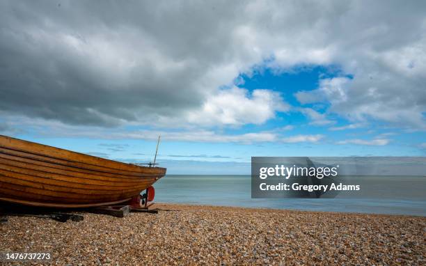 boat on deal beach on the english channel - cross channel stock pictures, royalty-free photos & images