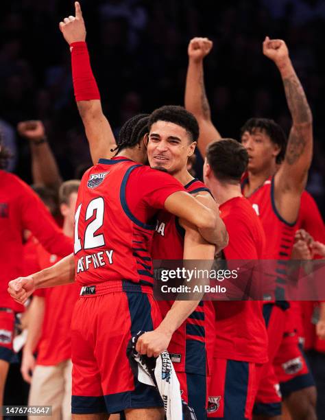Jalen Gaffney and Bryan Greenlee of the Florida Atlantic Owls celebrate after defeating the Kansas State Wildcats in the Elite Eight round game of...