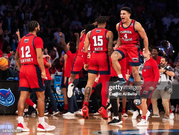 Jalen Gaffney and Bryan Greenlee of the Florida Atlantic Owls celebrate after defeating the Kansas State Wildcats in the Elite Eight round game of...