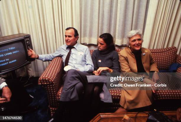 George H. W. Bush and his daughter, Dorothy, and his wife Barbara watching the Presidential election results the night of his election against Mike...