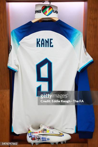 The shirt of Harry Kane is seen alongside their new Nike boots to mark becoming England's All Time Leading Goalscorer are seen inside the England...